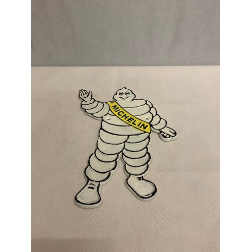 241 - Cast metal Michelin man sign.