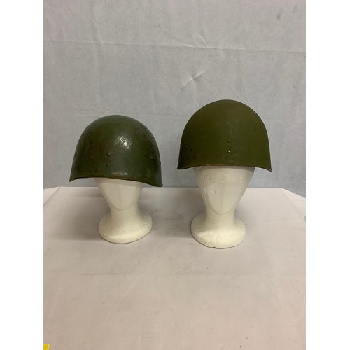 333 - 2 Vintage army helmets.