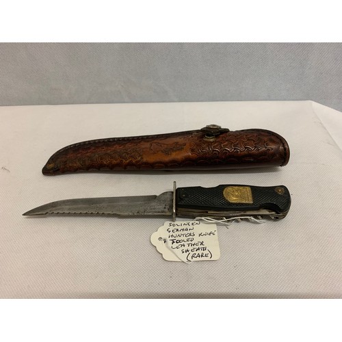 336 - Rare Solingen German hunters knife and leather sheath.