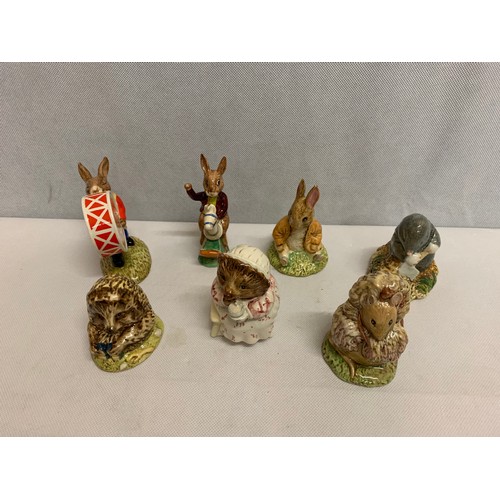 353 - Bewsick and Royal doulton animal figures to include Beatrix Potter and bunnykins.