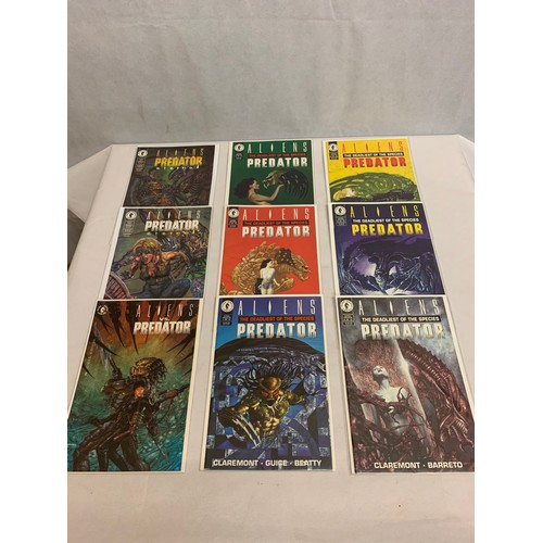 371 - Collection of Alien v Predator comics in plastic covers.