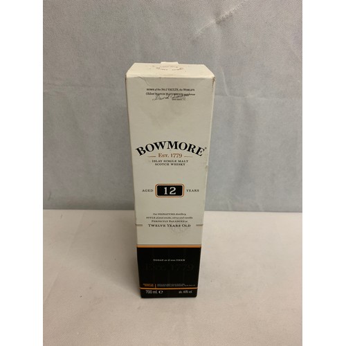 22c - Boxed bottle of 12 year Bowmore malt whisky.