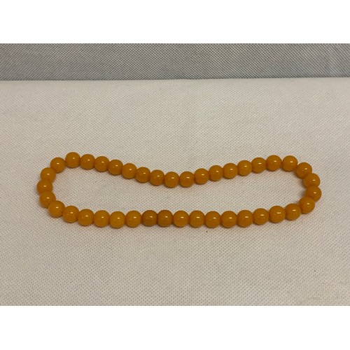 307d - Set of butterscotch, amber/bakelite? prayer beads. See pics