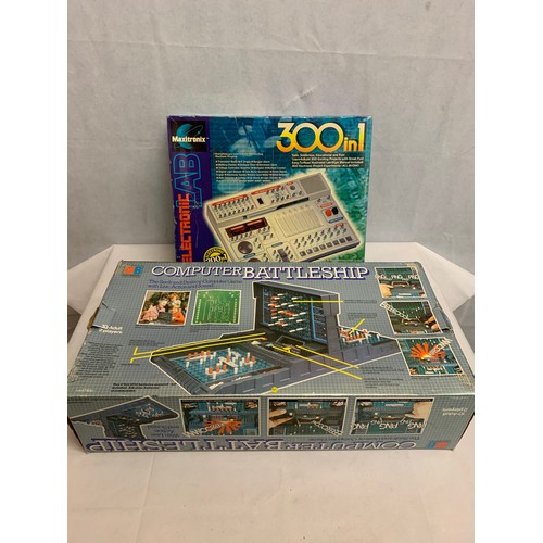 424 - Boxed computer Battleship game and electronic 300 in 1 game.