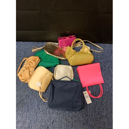 471 - Selection of new handbags.