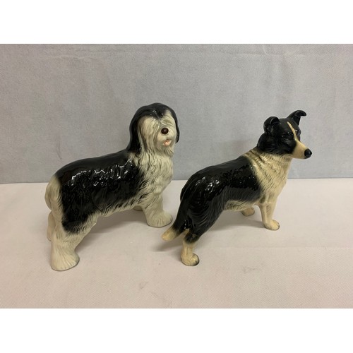 490 - 2 ceramic dog ornaments