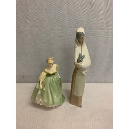 491 - Royal Doulton figurine along with Lladro figurine.