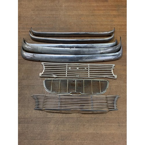 495 - Selection of vintage car bumpers and grills.