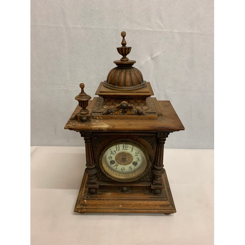 496 - Vintage wood framed mantle clock (needs attention)