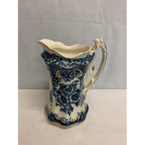 503 - Victorian blue and white jug with gilt detailing.