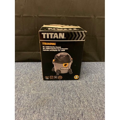 525 - New boxed Titan hoover.