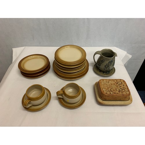 556 - Selection of stone ware pottery.