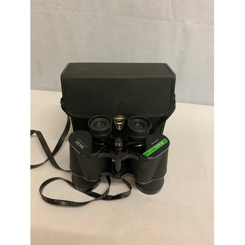 568 - Pair of Green's binoculars with case.