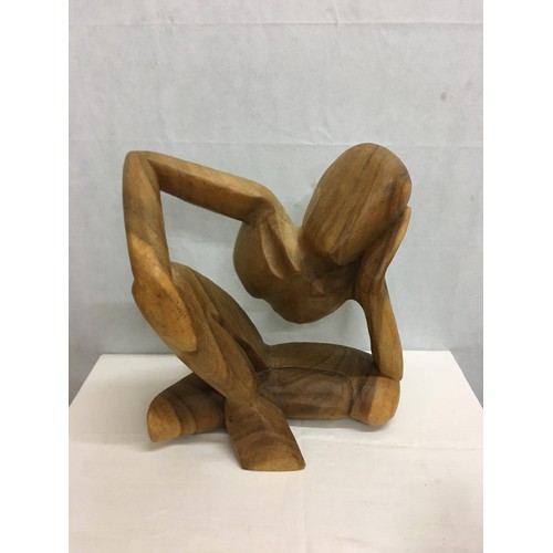 7 - Large wooden man sculpture. 47cm tall x 43cm wide