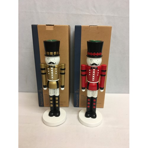 9 - Pair of new, boxed Nutcracker tea light holders. Stand 33cm tall.