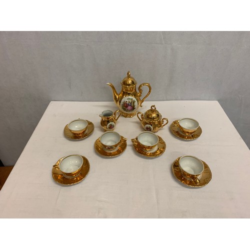 66 - Vintage gilded tea set.