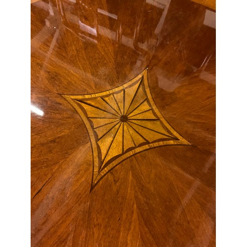 80 - Italian round, inlaid coffee table.