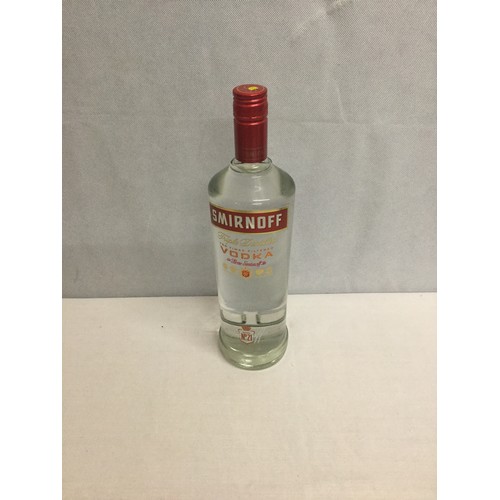 93 - Litre bottle of Smirnoff vodka.