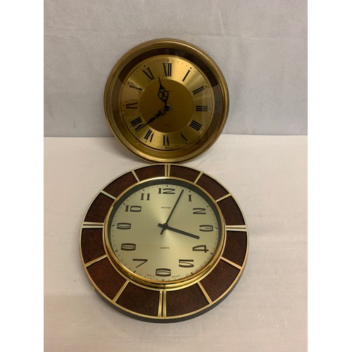 104 - 2 vintage Metamec clocks.