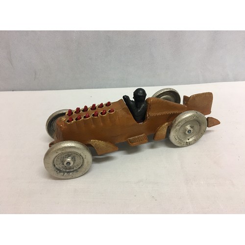 114 - Cast iron moving piston race car model.