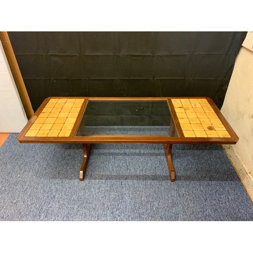 140 - Retro tile and glass coffee table.