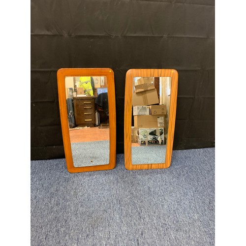 141 - Pair of mid century wall mirrors.