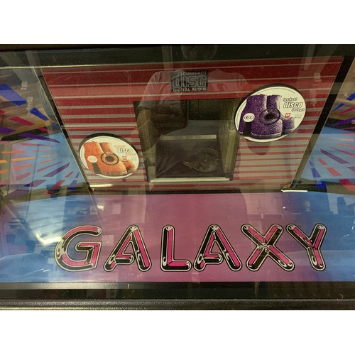 143 - NSM Galaxy CD juke box, holds 100 CD'S in excellent working condition. Includes remote control and k... 