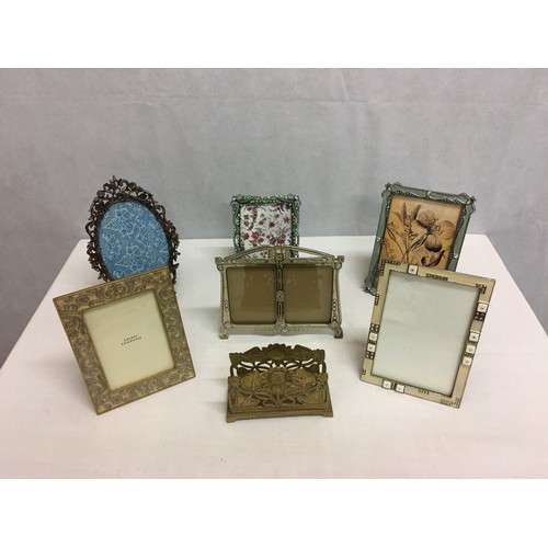 147 - 6 photoframes and brass letter holder.