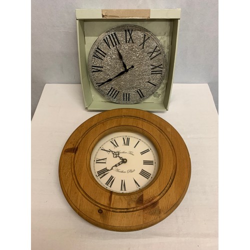 154 - New boxed wall clock along with round pine clock.