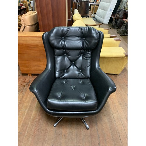 171 - Retro black vinyl swivel chair. Possibly Parker Knowle. See pics.