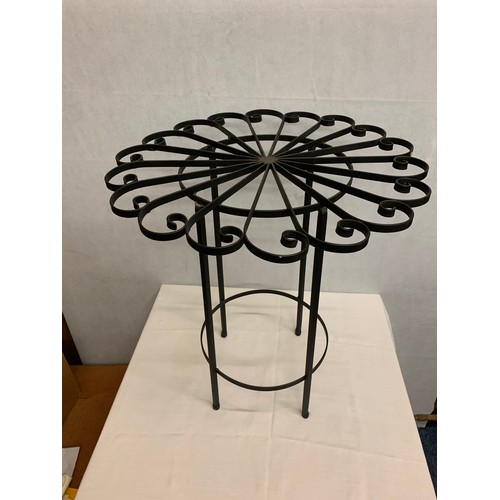 176 - Wrought iron window table.