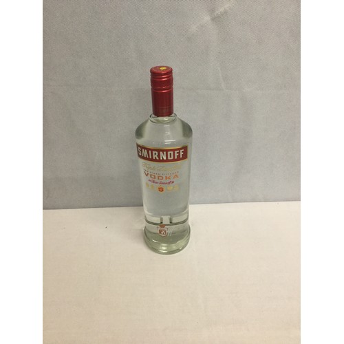 262 - Litre bottle of Smirnoff.