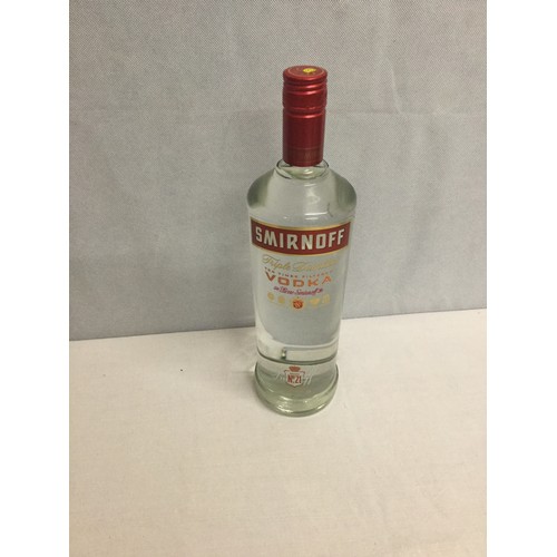 263 - Litre bottle of Smirnoff.