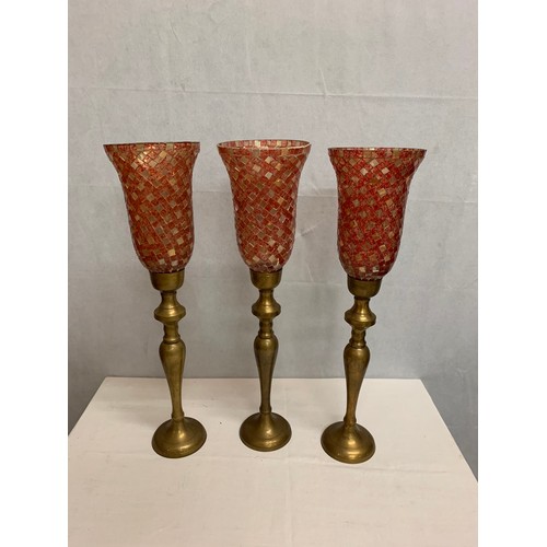 299 - 3 tall candle holders.