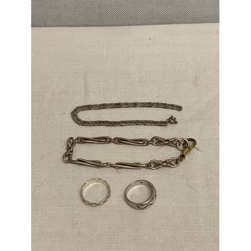 331 - 2 silver bracelets and 2 silver rings.