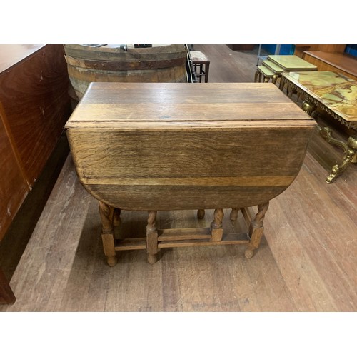 396 - Vintage dropleaf table with barley twist legs.