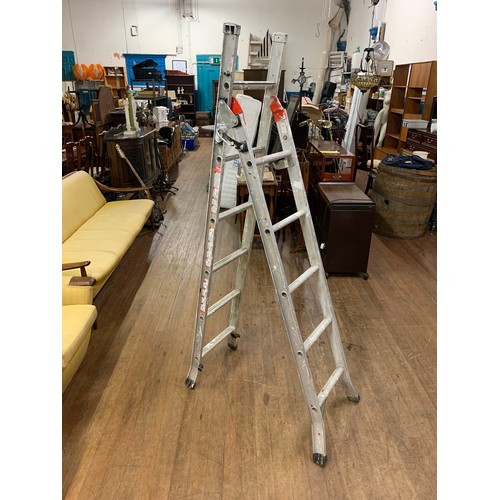 399 - Set of aluminium decorators ladders.