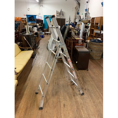 414 - Set of aluminium decorators ladders.