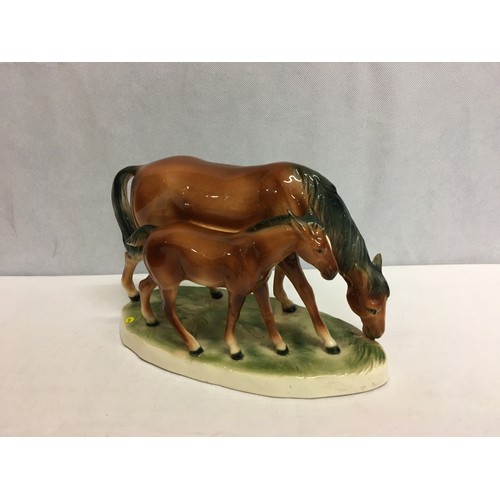 430 - Horse and foal ornament.