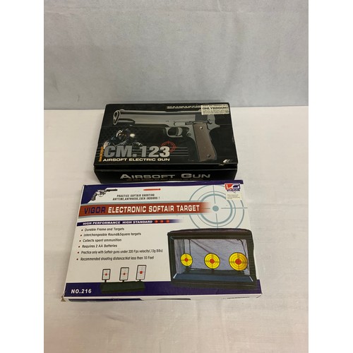 432 - Boxed CM.123 airsoft electric gun with electronic softair target.