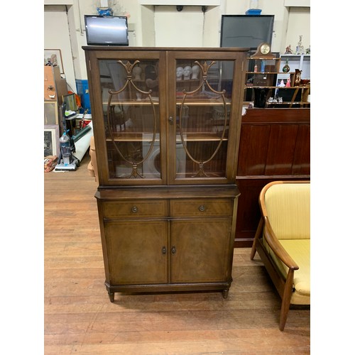 450 - Vintage glass fronted bookcase.