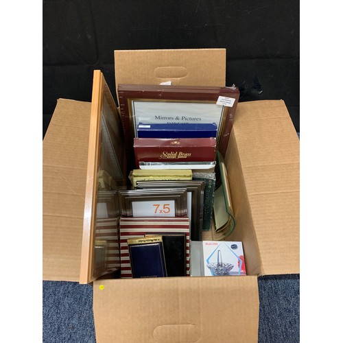 470 - Box of new photo frames etc.