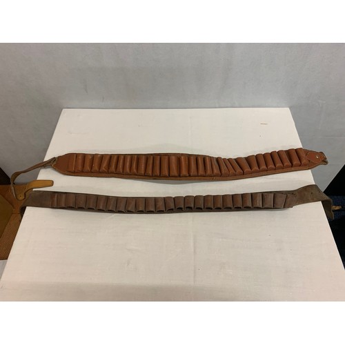 501 - 2 leather bullet belts.