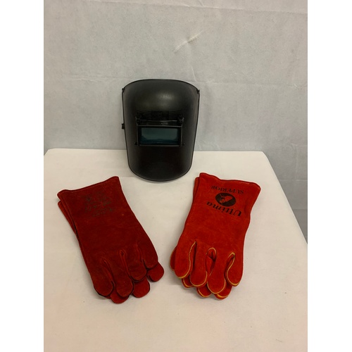 512 - New welding mask and 2 pairs of gloves.