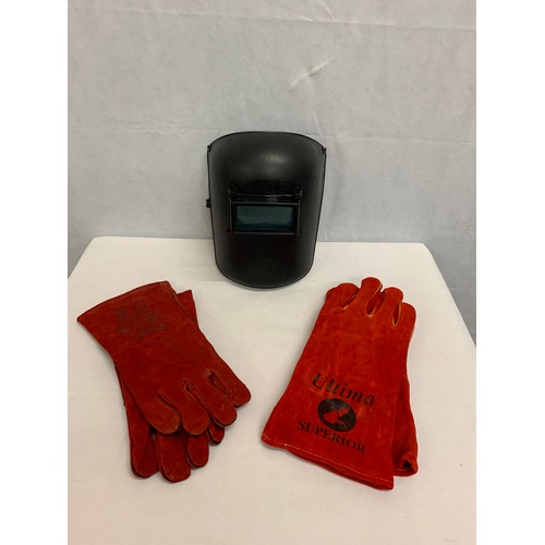 513 - New welding mask and 2 pairs of gloves.