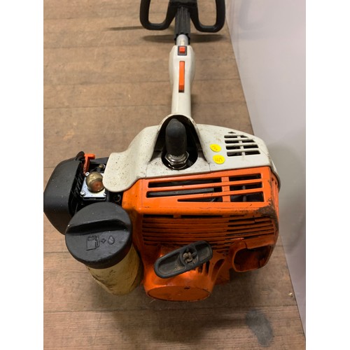 103 - Stihl petrol hedge trimmer.