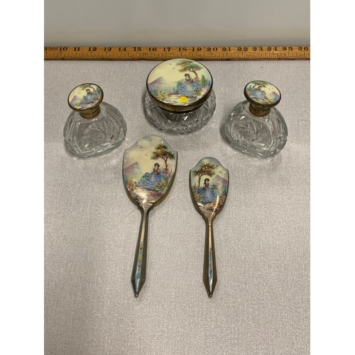 10 - Antique, enamel, 5 piece dressing table set depicting young lady walking in gardens.