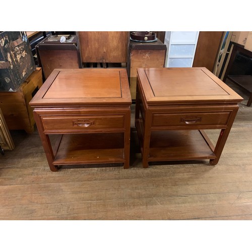 159 - Pair of solid wood Oriental look end tables.