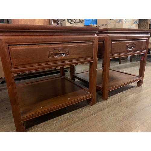 159 - Pair of solid wood Oriental look end tables.