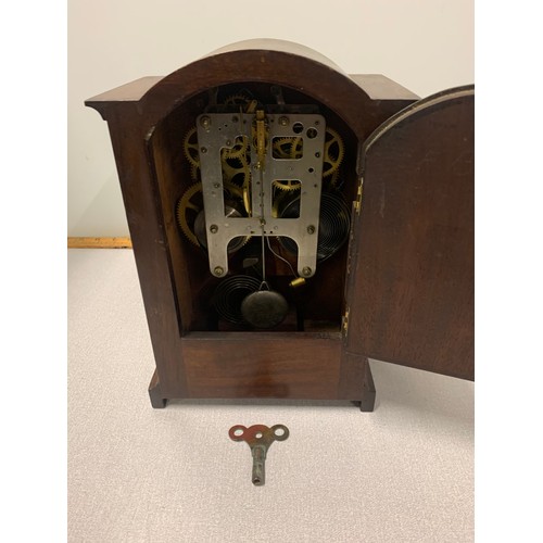 178 - Vintage inlaid mantle clock with key and pendulum.